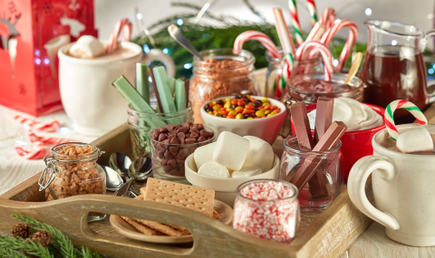 tray with candies and treats, like M&Ms and mints, to put in a hot chocolate jar