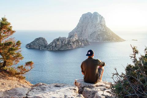 man with peaceful view on travel