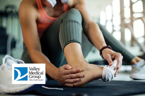 athlete tending to foot and skin