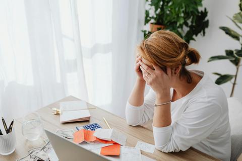 adult stressed about financial planning