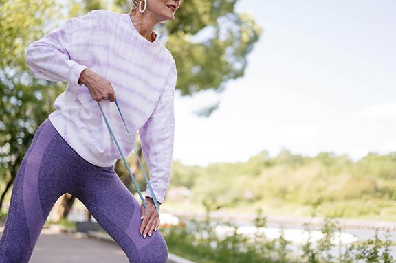 woman exercising with stretch bands